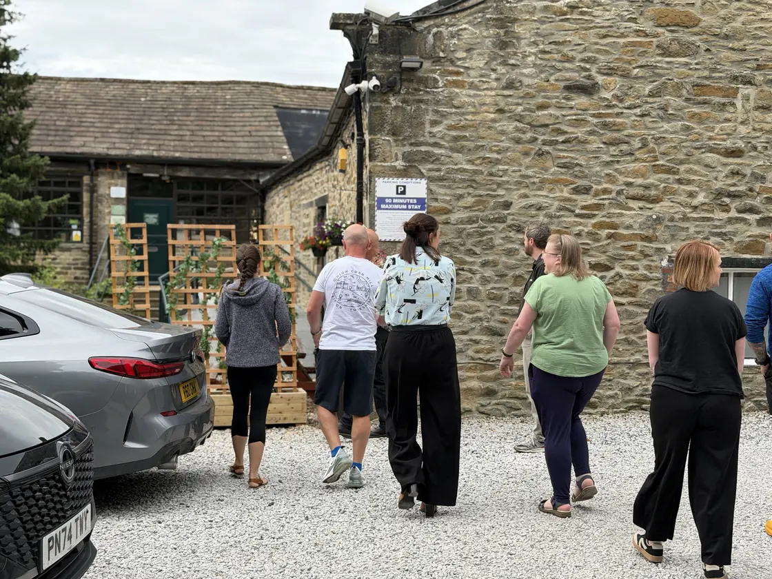 A tour group at High Corn Mill